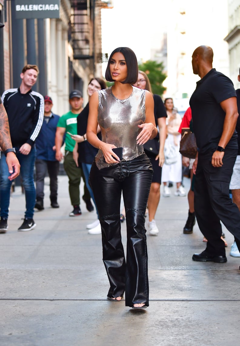 Edgy Night Out: Black Lace-Up Leather Pants with Metallic Top Edgy Night Out: Black Lace-Up Leather Pants with Metallic Top — Leather Pants Outfits 2027