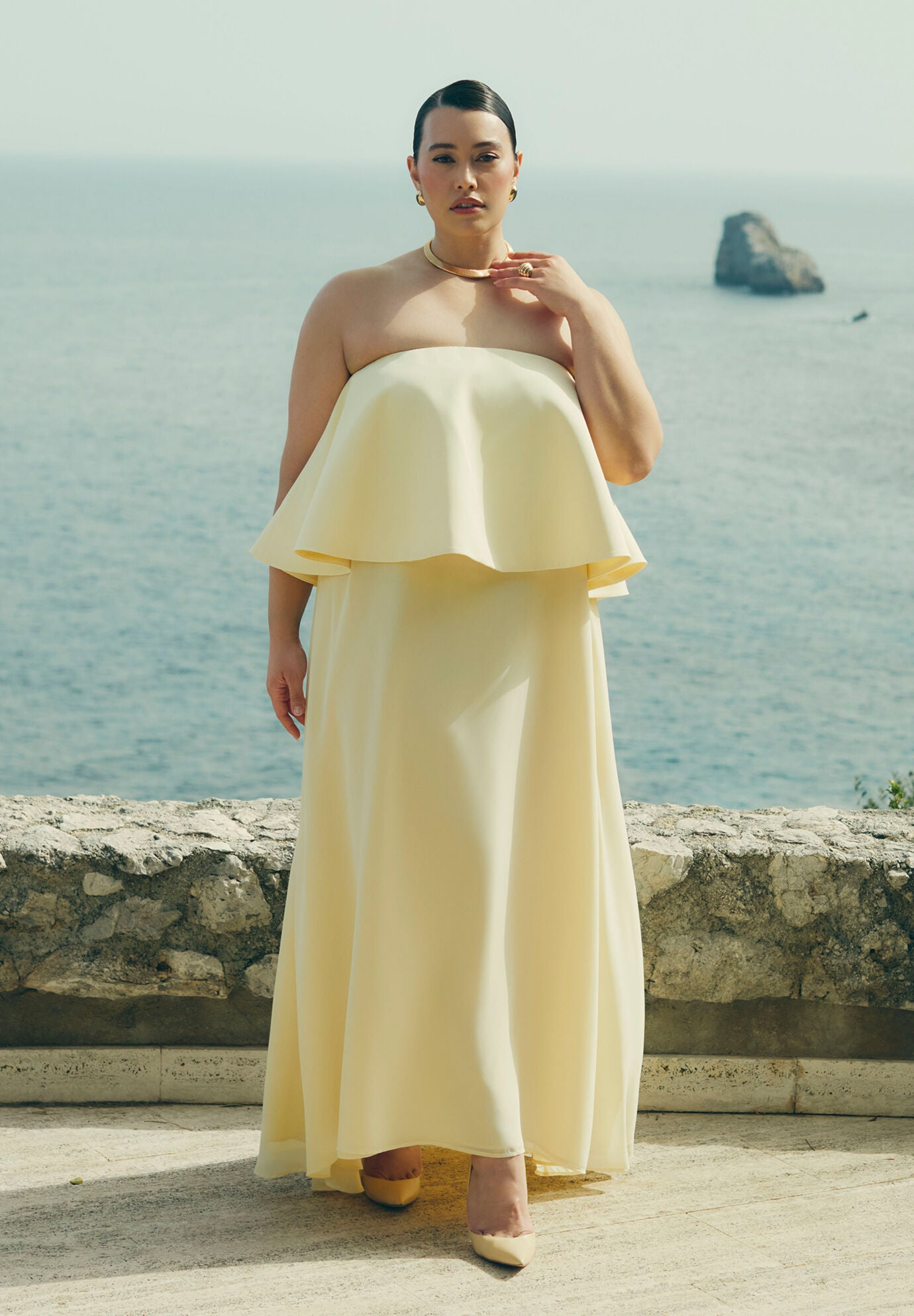 Pale Yellow Strapless Gown with Peplum Detail Pale Yellow Strapless Gown with Peplum Detail — Plus Size Wedding Guest Outfits 2027