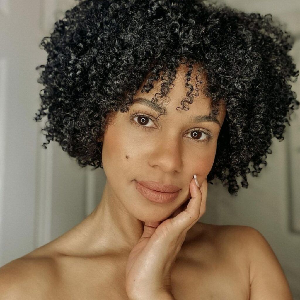Chin-Length Black Bob With Defined Curls and Bangs Chin-Length Black Bob With Defined Curls and Bangs — Wash and Go Hairstyles 2027