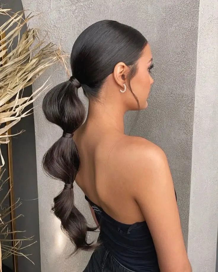 Modern Black Bubble Ponytail — Prom Hair 2027 for Strapless Dress