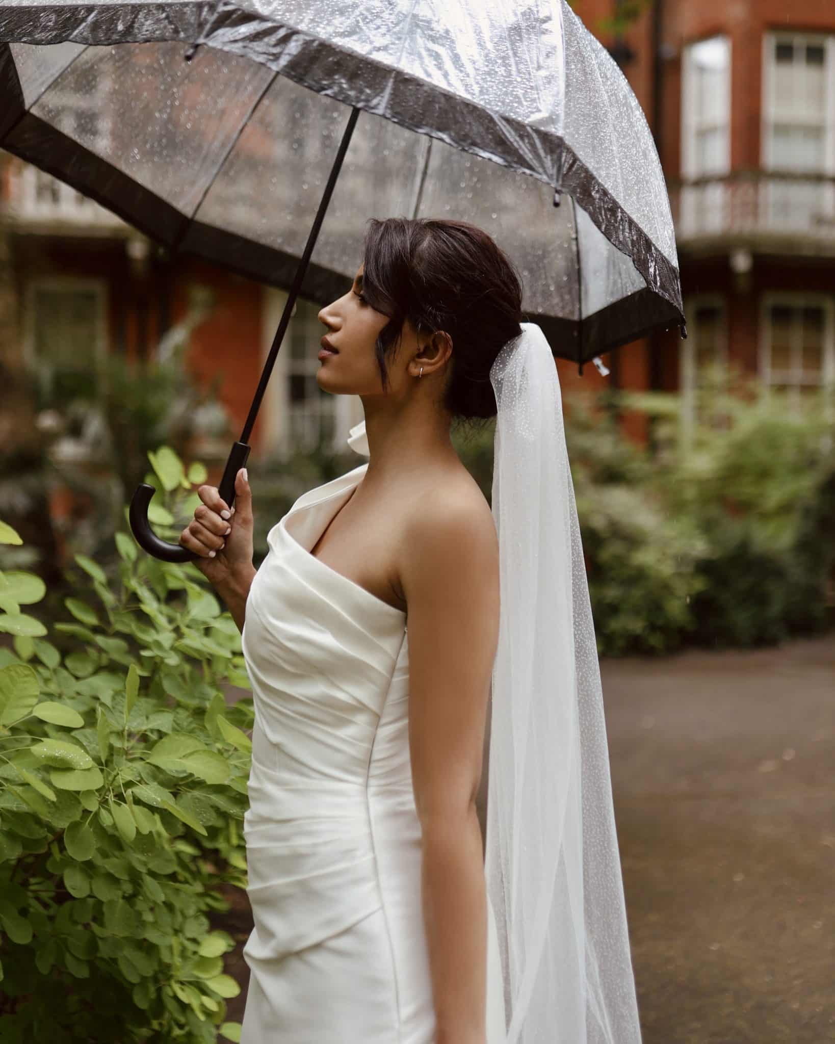 Sleek Dark Brown Low Bun With Veil — Bride Hairstyles 2027