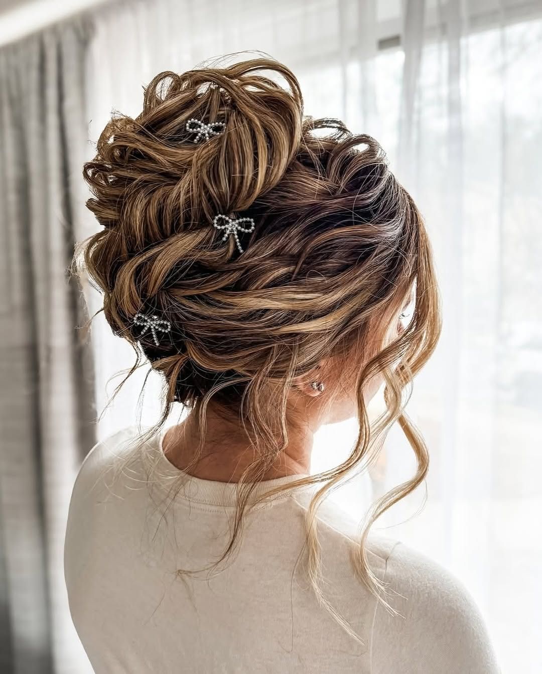 Voluminous Ash Blonde Updo with Pins — Graduation Updos 2027