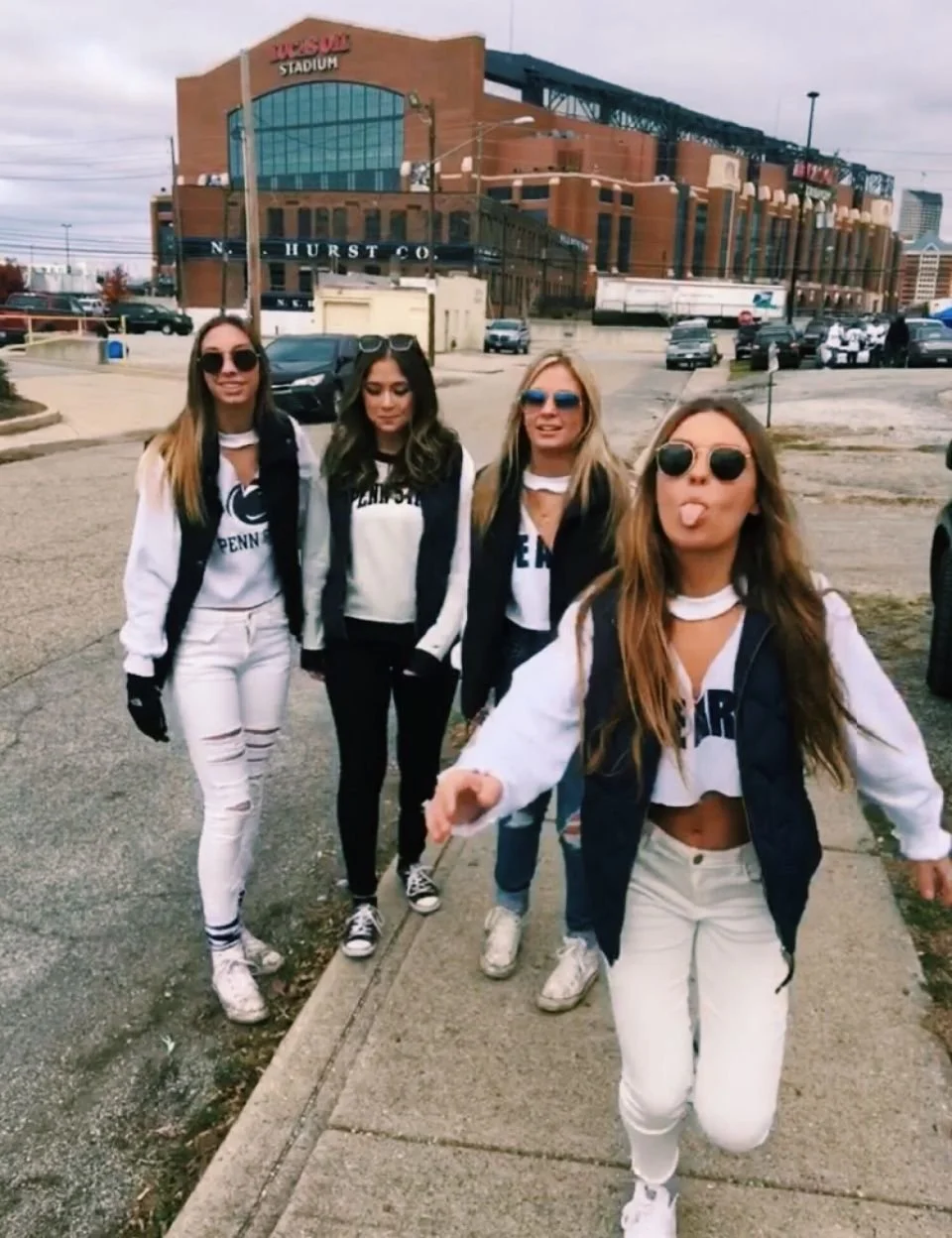 Team Colors: White Shirts and Navy Vests with Sneakers — College Game Day Outfits 2026