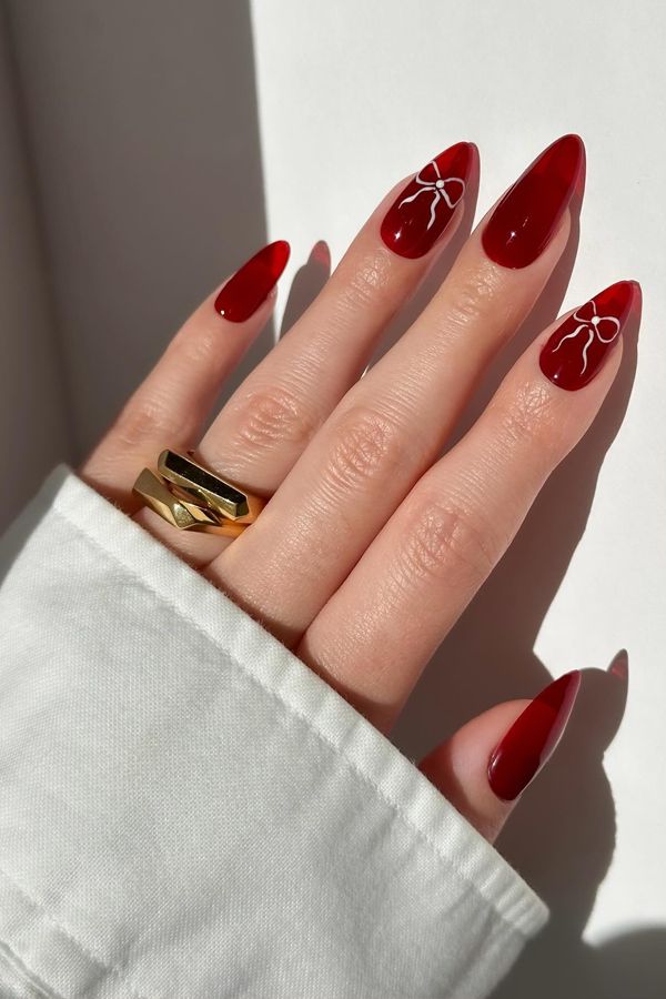 Translucent Red Stilettos with White Bows Translucent Red Stilettos with White Bows — Winter Formal Nails 2027
