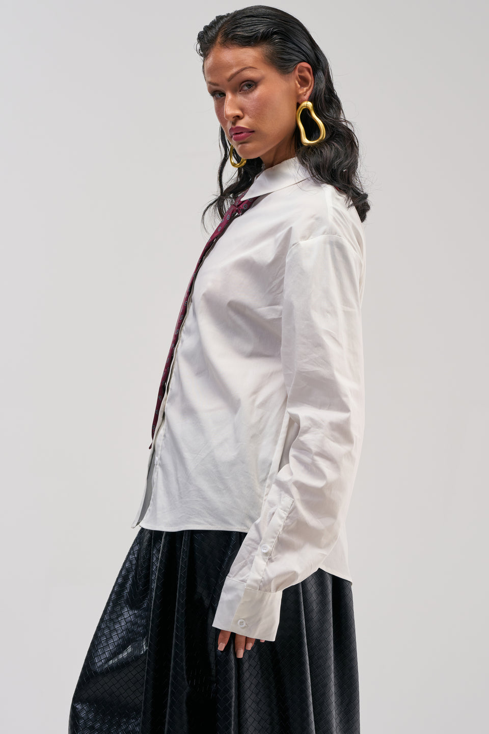 Oversized White Shirt with Tie and Faux Leather Mini Skirt — Corporate Baddie Outfits 2027