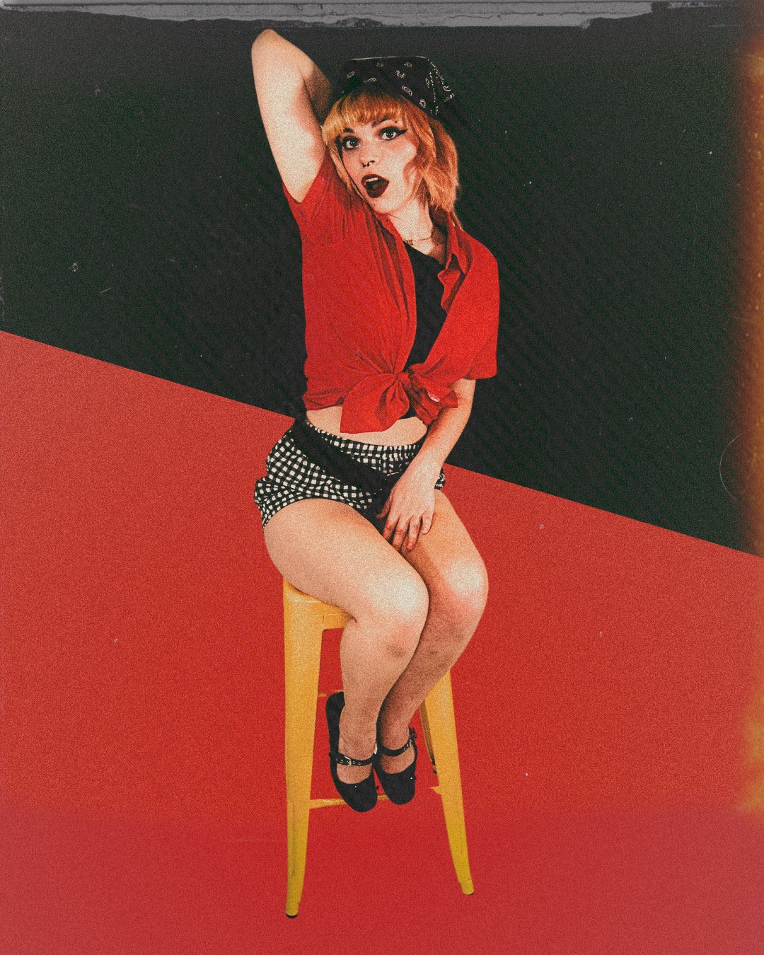 Tied Red Shirt Over Crop Top with Checkered Shorts Tied Red Shirt Over Crop Top with Checkered Shorts — Pin Up Outfits 2027