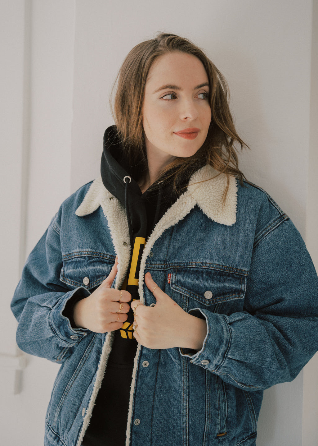 Layered Sherpa Denim Jacket Over a Hoodie Layered Sherpa Denim Jacket Over a Hoodie — Sherpa Denim Jacket Outfits 2027
