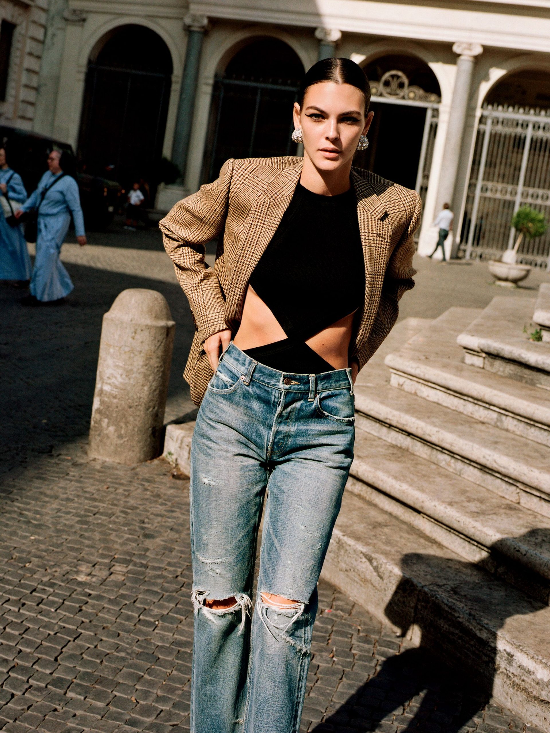 Edgy Casual: Distressed Bootcut Jeans with Cutout Bodysuit and Plaid Blazer — Bootcut Jeans Outfits 2027 with Sandals