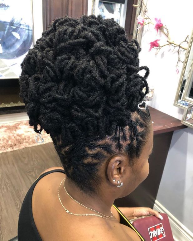 Voluminous Black Locs Bun with Braided Details Voluminous Black Locs Bun with Braided Details — Loc Styles 2027 for Women Over 50
