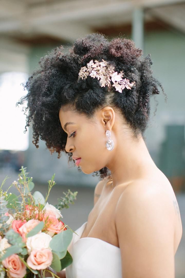 Coily Updo With Floral Accent Coily Updo With Floral Accent — Church Wedding Hairstyles 2027