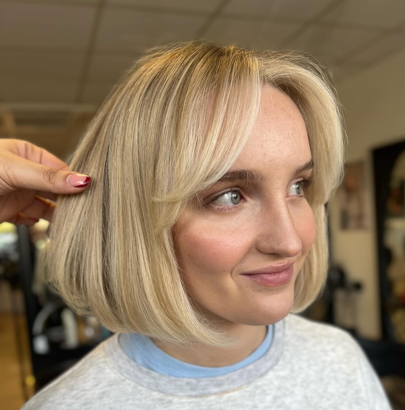 Light Blonde Voluminous Layered Bob With Curtain Bangs — Blunt Bob 2027