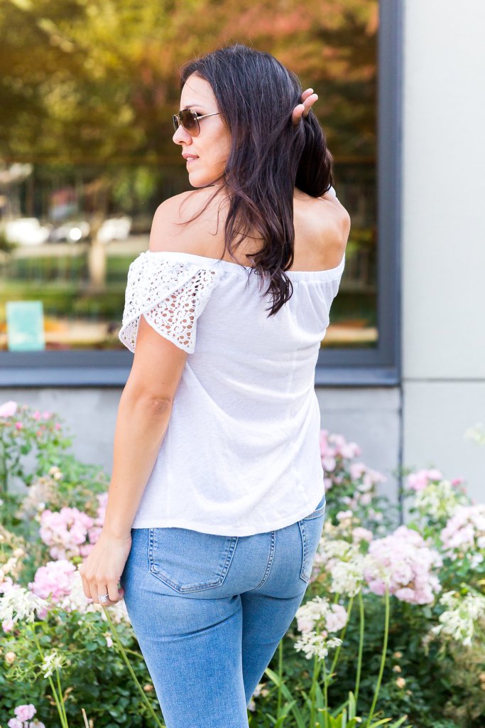 White Off-Shoulder Top with Lace Sleeve Details and Blue Jeans — Off the Shoulder Top Outfits 2027