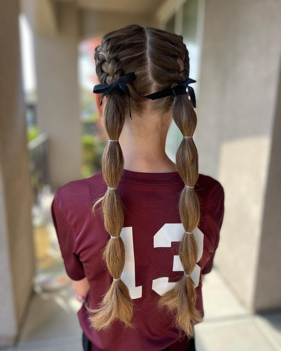 Sleek High Ponytail with Wavy Ends Sleek High Ponytail with Wavy Ends — Game Day Hairstyles 2026