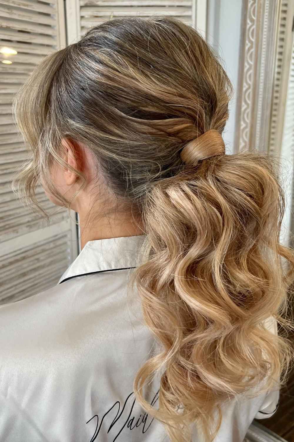 Honey Blonde Low Side Ponytail Curls — Ponytail Bachelorette Hairstyles 2027