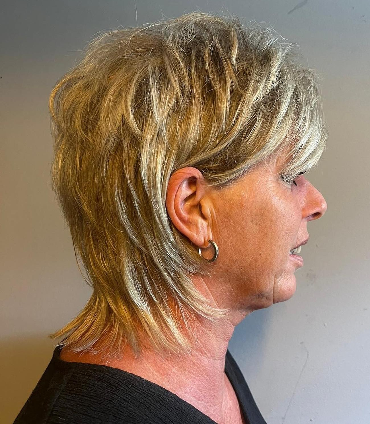 Side-Swept Blonde Shag With Choppy Layers Side-Swept Blonde Shag With Choppy Layers — Short Shag 2027