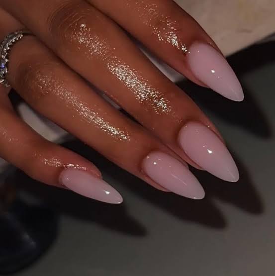 One Hand Close Macro Sheer Pale Pink Glossy Almonds One Hand Close Macro Sheer Pale Pink Glossy Almonds — Long Almond Nails 2027