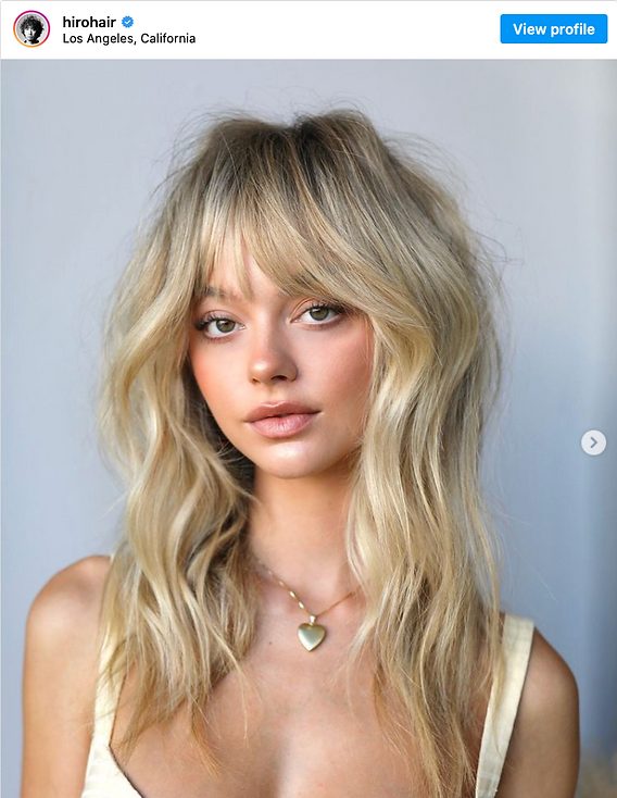 Ash Blonde With Highlights Textured Shag With Wispy Bangs Ash Blonde With Highlights Textured Shag With Wispy Bangs — Bangs Trends 2027