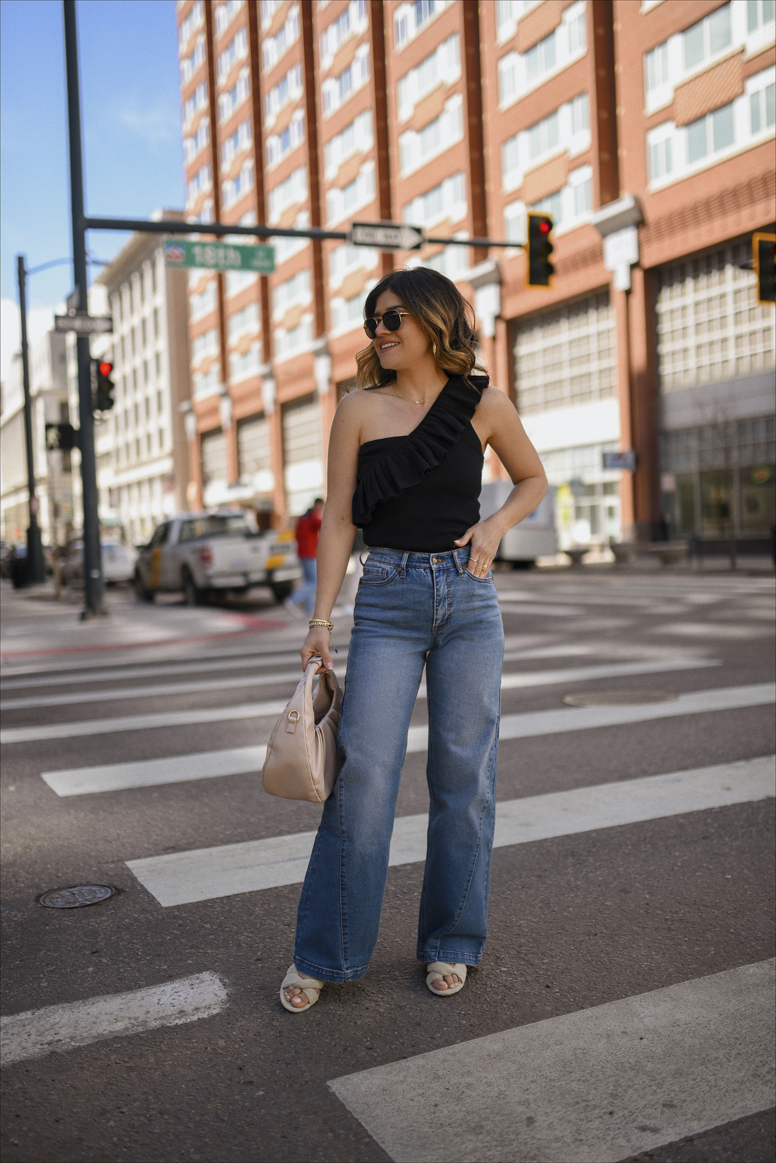 Light Blue Wide-Leg Jeans Styled with a Black One-Shoulder Ruffled Top Light Blue Wide-Leg Jeans Styled with a Black One-Shoulder Ruffled Top — Spring Outfits 2027 with Jeans