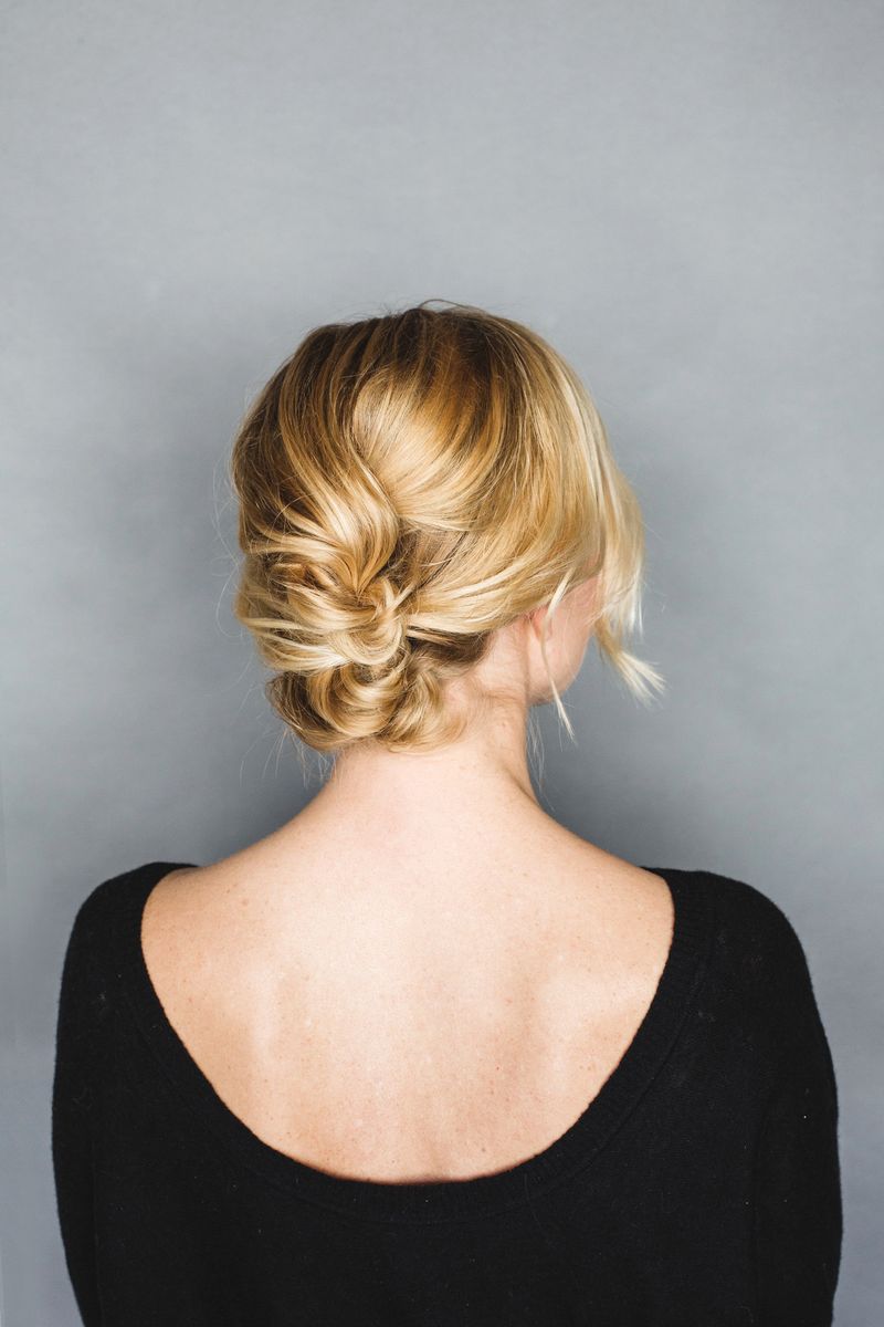 Blonde Wavy Low Bun with Wispy Bangs Blonde Wavy Low Bun with Wispy Bangs — Updos 2027 for Short Hair