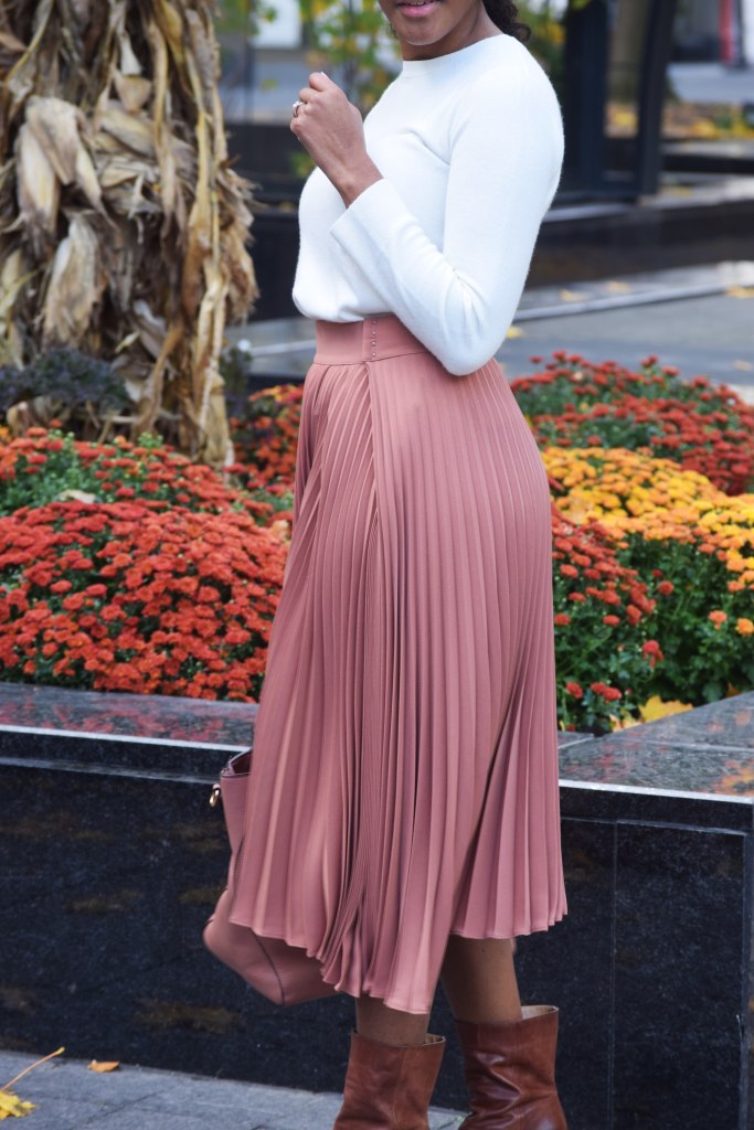 Rose Pink Satin Pleated Midi Skirt with White Knit Top and Brown Boots — Pleated Skirt Outfits 2027