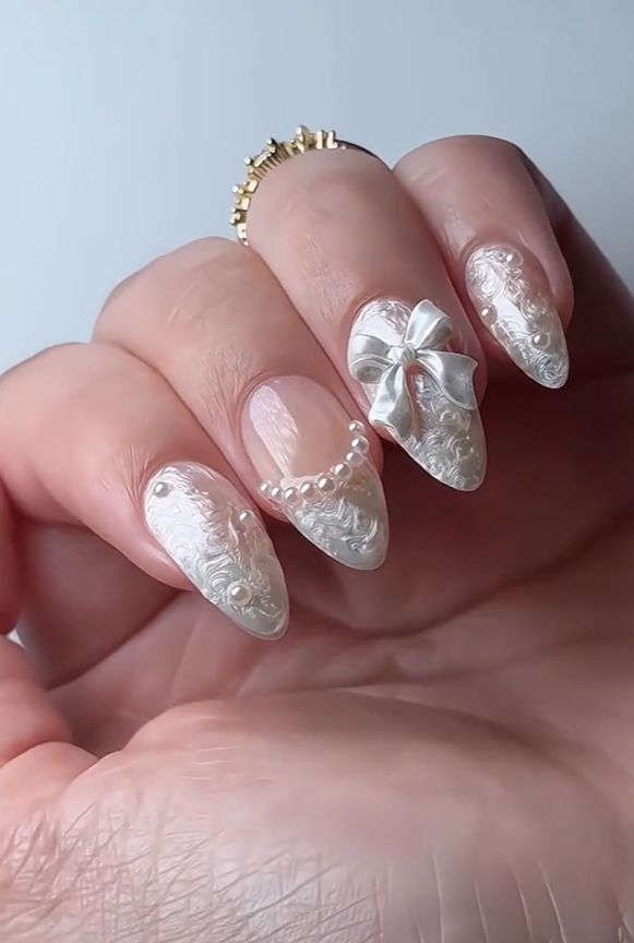 Sheer Nude Almond with 3D Lace Bow Sheer Nude Almond with 3D Lace Bow — Long Bow Nails 2027