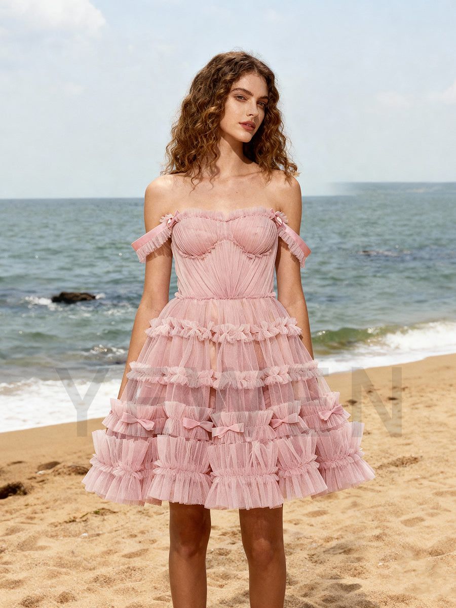 Blush Pink Off-the-Shoulder Tulle Mini Dress with Tiered Ruffles and Bows Blush Pink Off-the-Shoulder Tulle Mini Dress with Tiered Ruffles and Bows — Blush Rehearsal Dinner Dress 2027