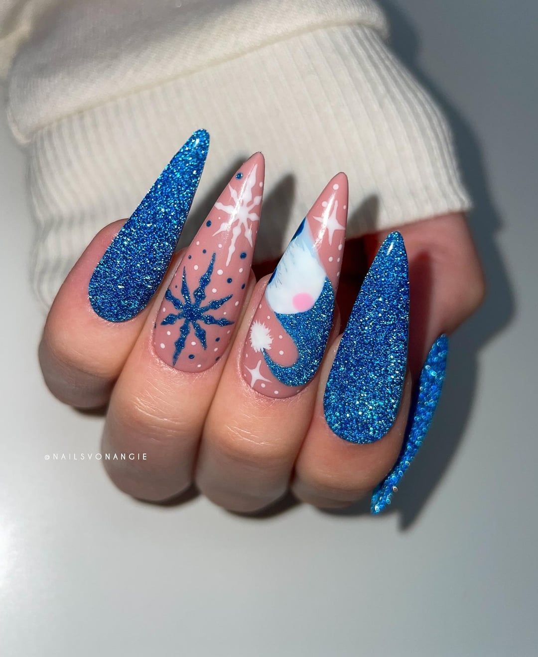 Vibrant Blue Glitter and Matte Pink Stilettos Vibrant Blue Glitter and Matte Pink Stilettos — Blue Christmas Nails 2026