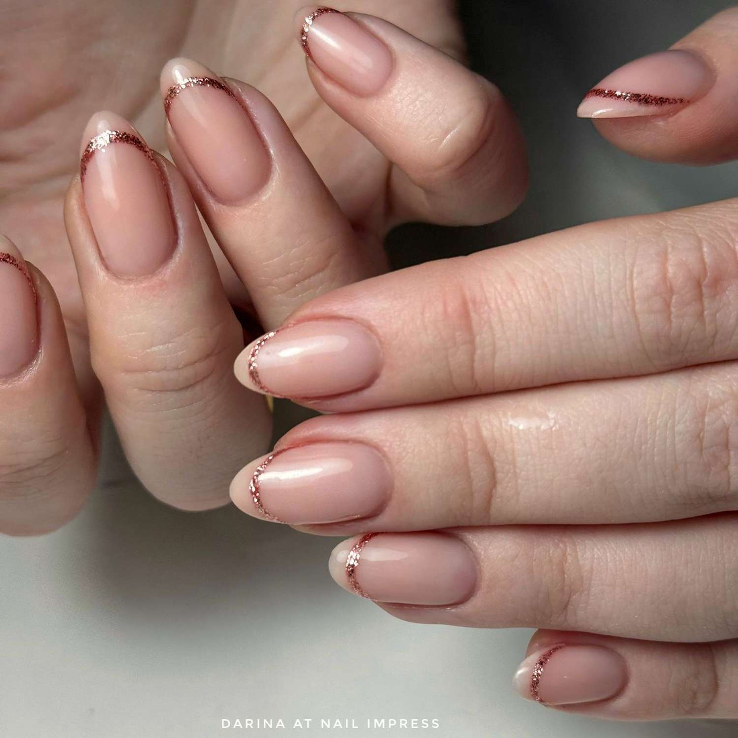 Medium Oval Nude With Rose Gold Glitter French Medium Oval Nude With Rose Gold Glitter French — Simple Graduation Nails 2027