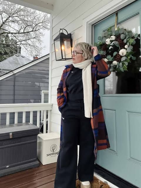 Coordinated Comfort: Ivory Sweater and Trousers with Beaded Handbag — Cold Weather Outfits 2027