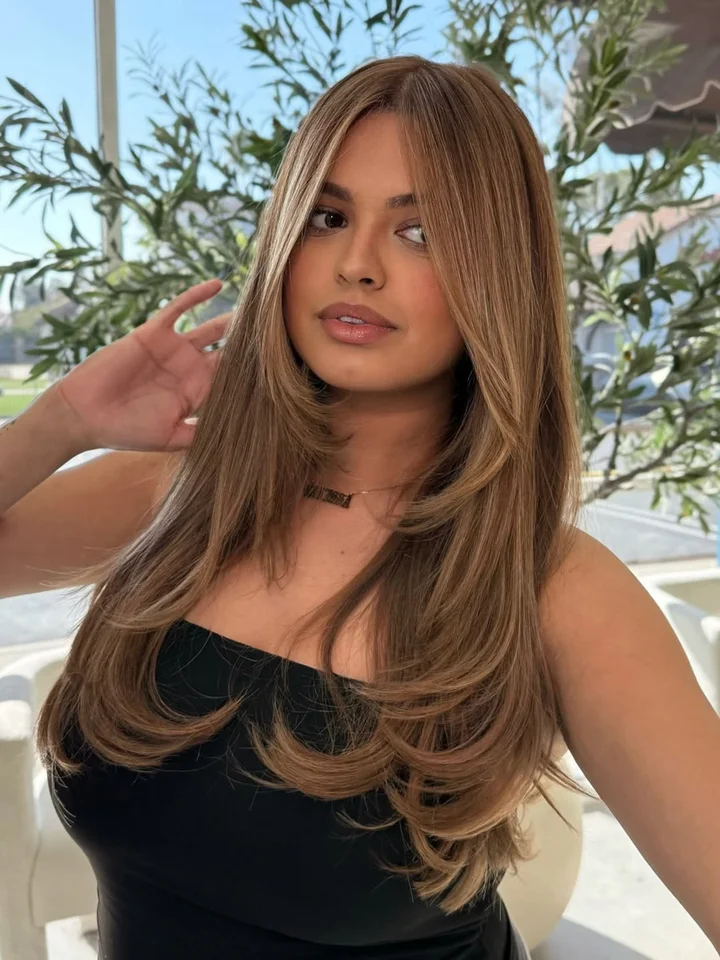Mid-Back Layered Hair With Curtain Bangs Mid-Back Layered Hair With Curtain Bangs — Trendy Haircuts 2027