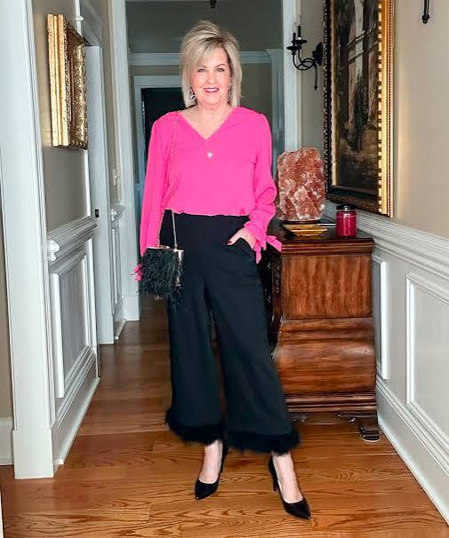 Hot Pink Blouse and Black Wide-Leg Pants with Feather Trim Hot Pink Blouse and Black Wide-Leg Pants with Feather Trim — Date Night Outfits 2027 for Women Over 50