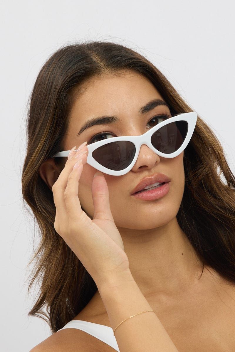 Minimalist White Cat Eyes with T-Shirt and Gold Hoops — Cat Eye Sunglasses Outfits 2027