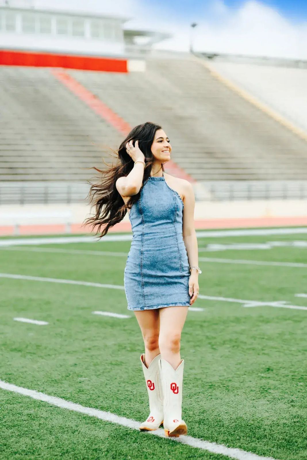 Denim Halter Dress and Cowboy Boots Denim Halter Dress and Cowboy Boots — Cheer Outfits for Women 2027