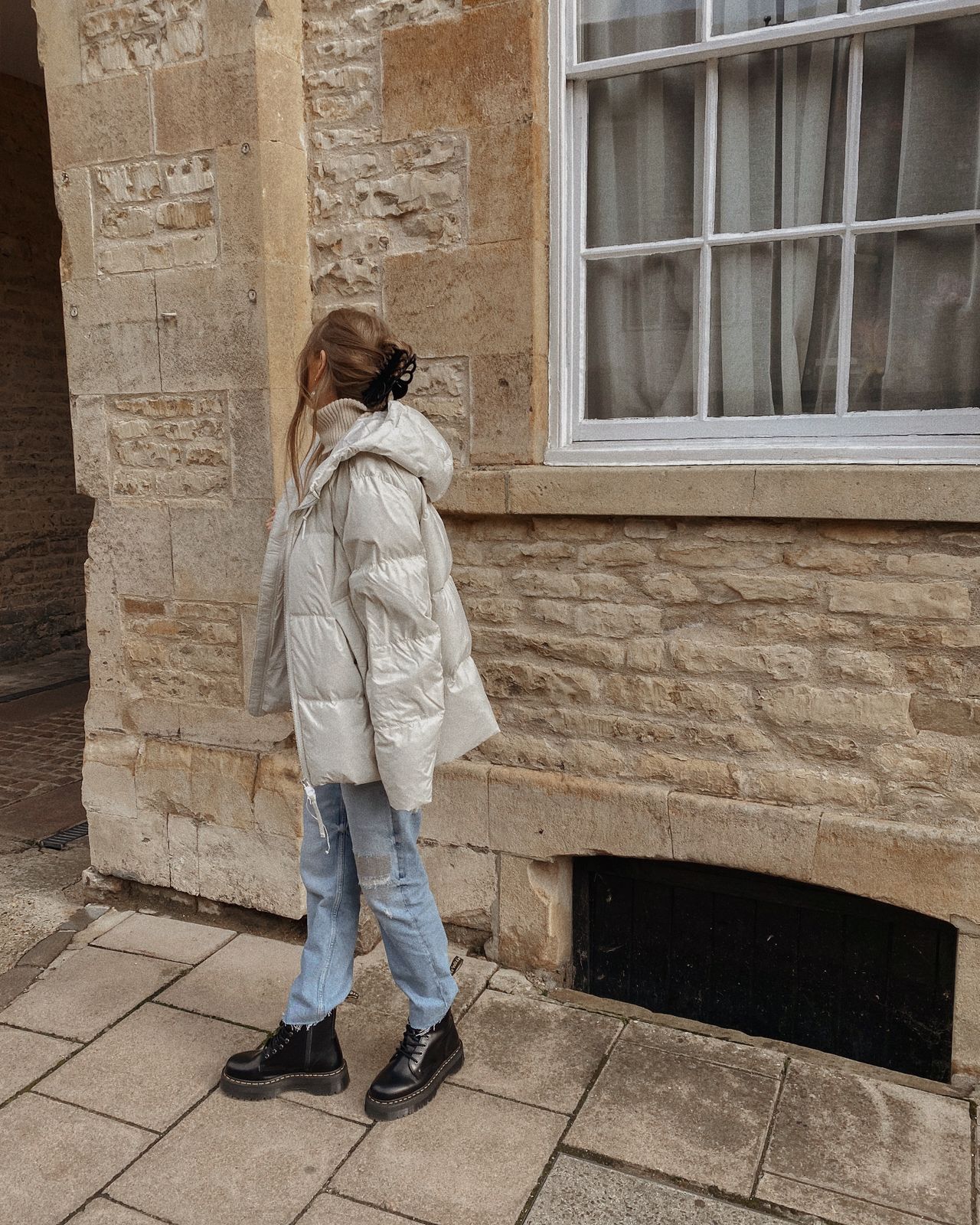 Silver Puffer Jacket with Ripped Jeans — Winter Puffer Jacket Outfits 2027