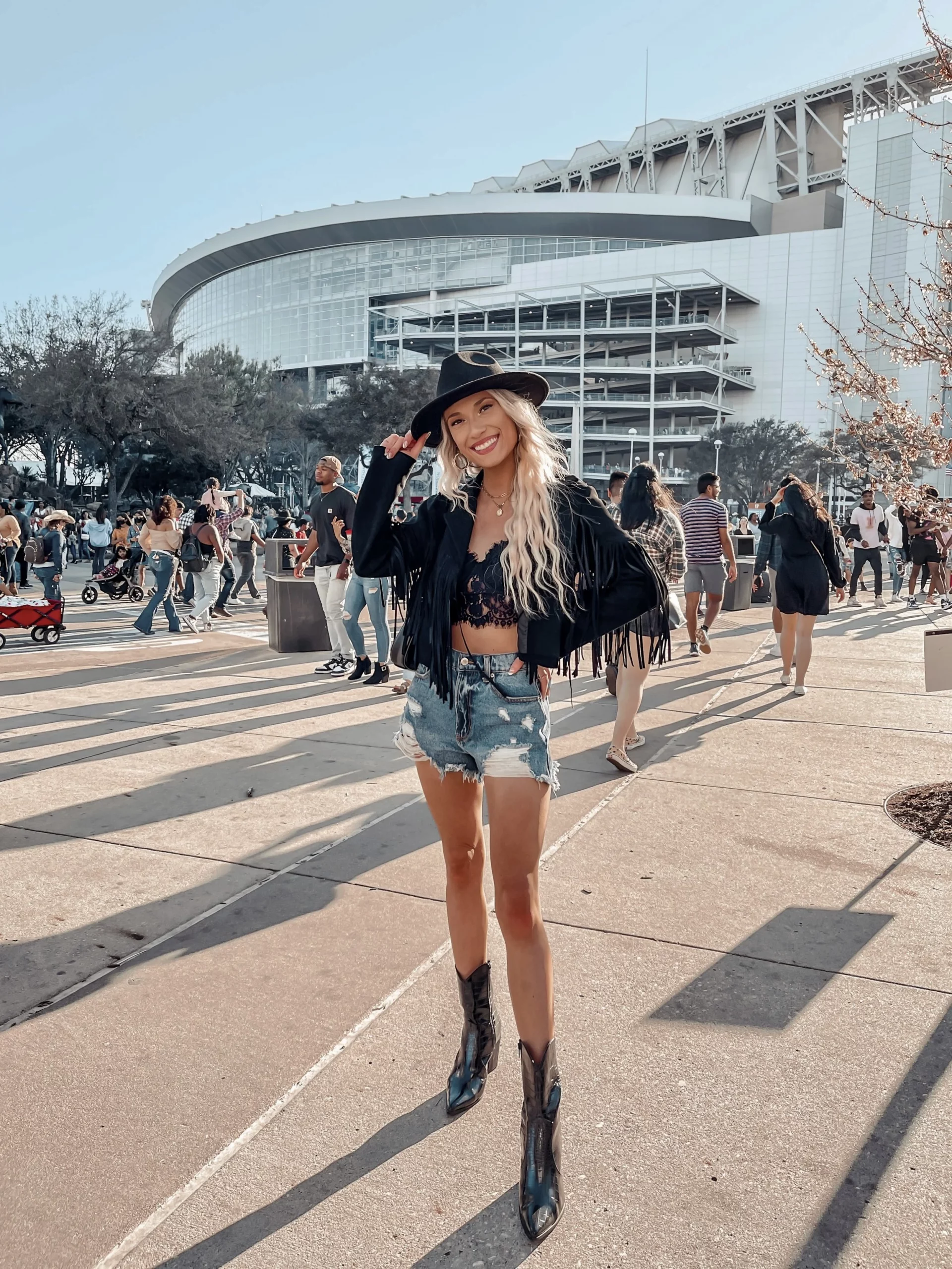 Black Fringed Jacket with Lace Bralette and Denim Shorts Black Fringed Jacket with Lace Bralette and Denim Shorts — Rodeo Outfits 2027