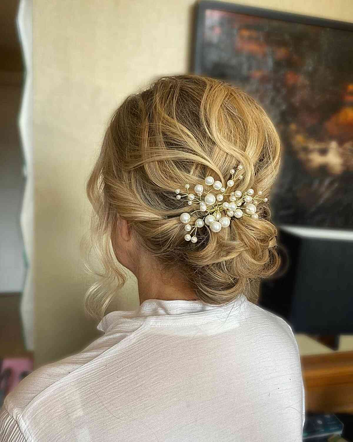 Blonde Low Bun With Pearl Accent Blonde Low Bun With Pearl Accent — Mother of the Bride Updos 2027