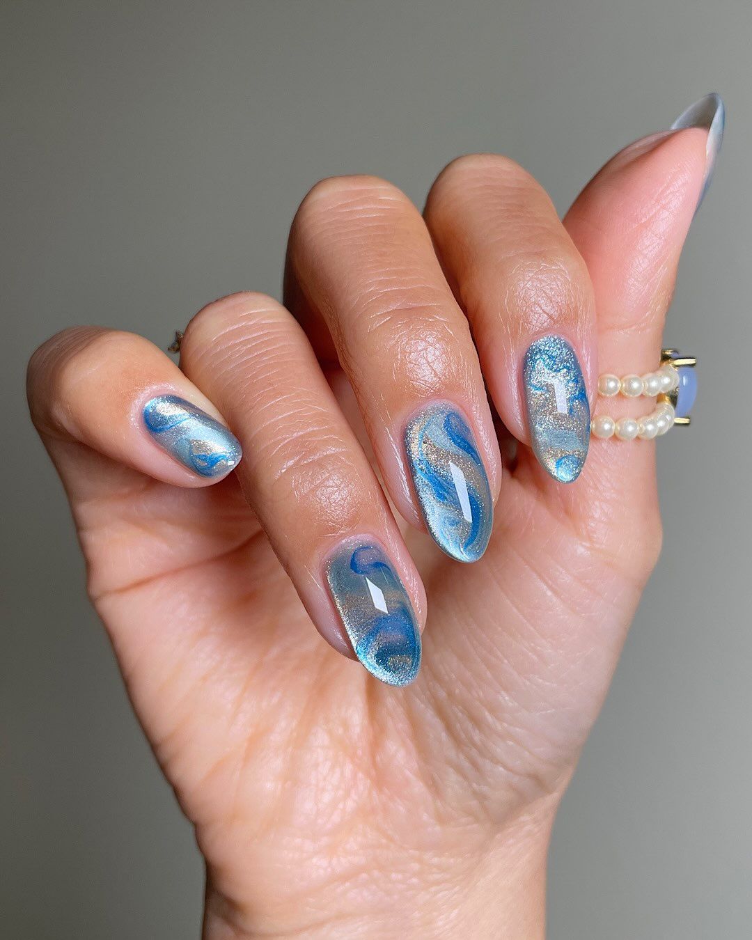 Abstract Blue and Silver Swirls Abstract Blue and Silver Swirls — Light Blue Quinceanera Nails 2027