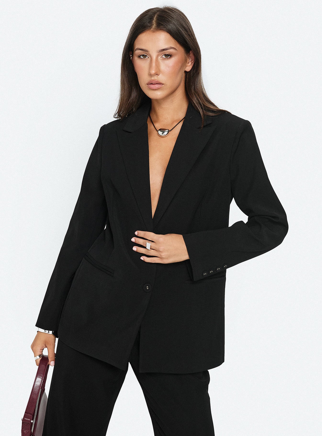 Oversized Black Blazer with Deep V-Neckline Oversized Black Blazer with Deep V-Neckline — Glamoratti Outfits 2027