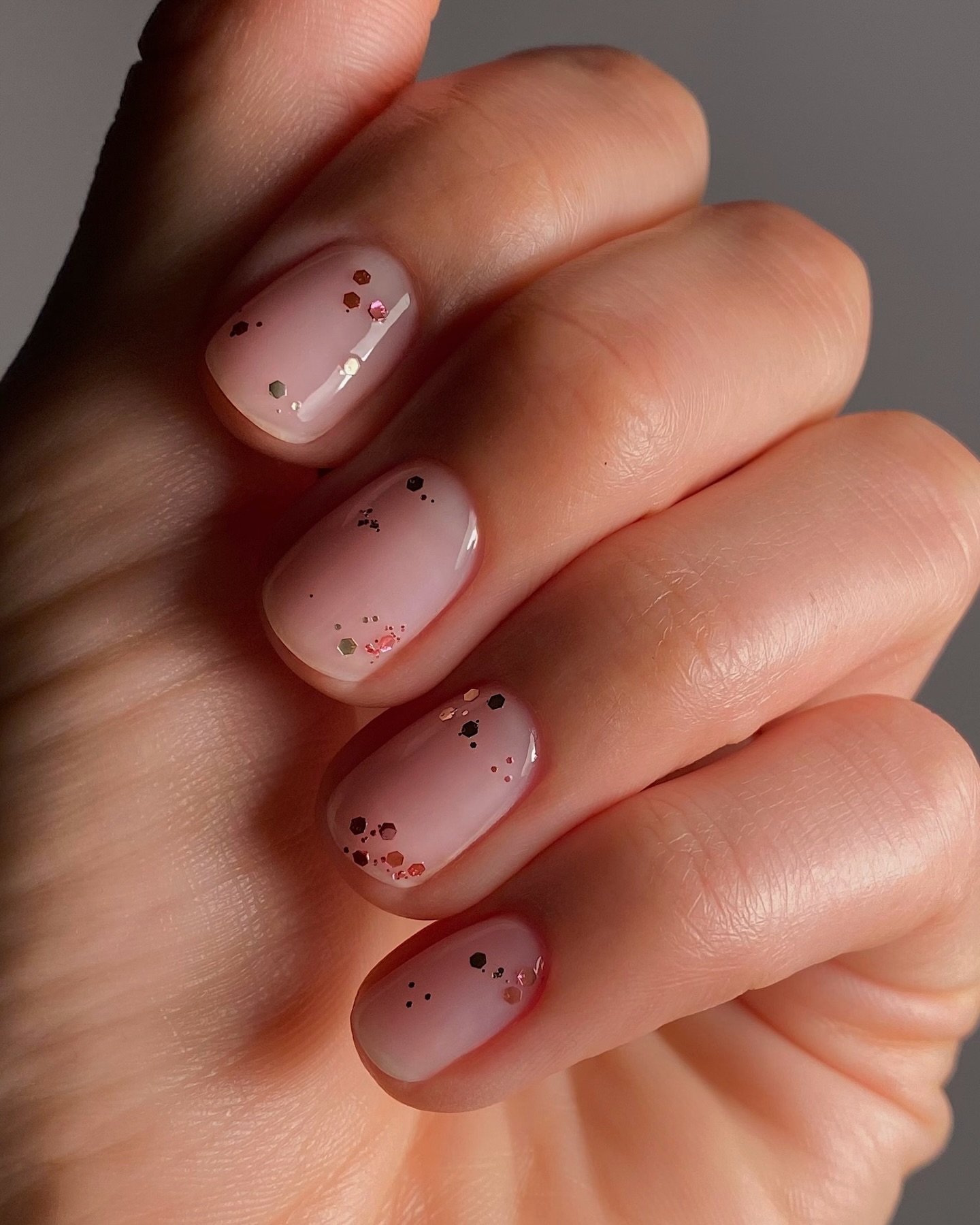 Short Oval Sheer Pink Nude Glitter Accents Short Oval Sheer Pink Nude Glitter Accents — Nurse Nails 2027