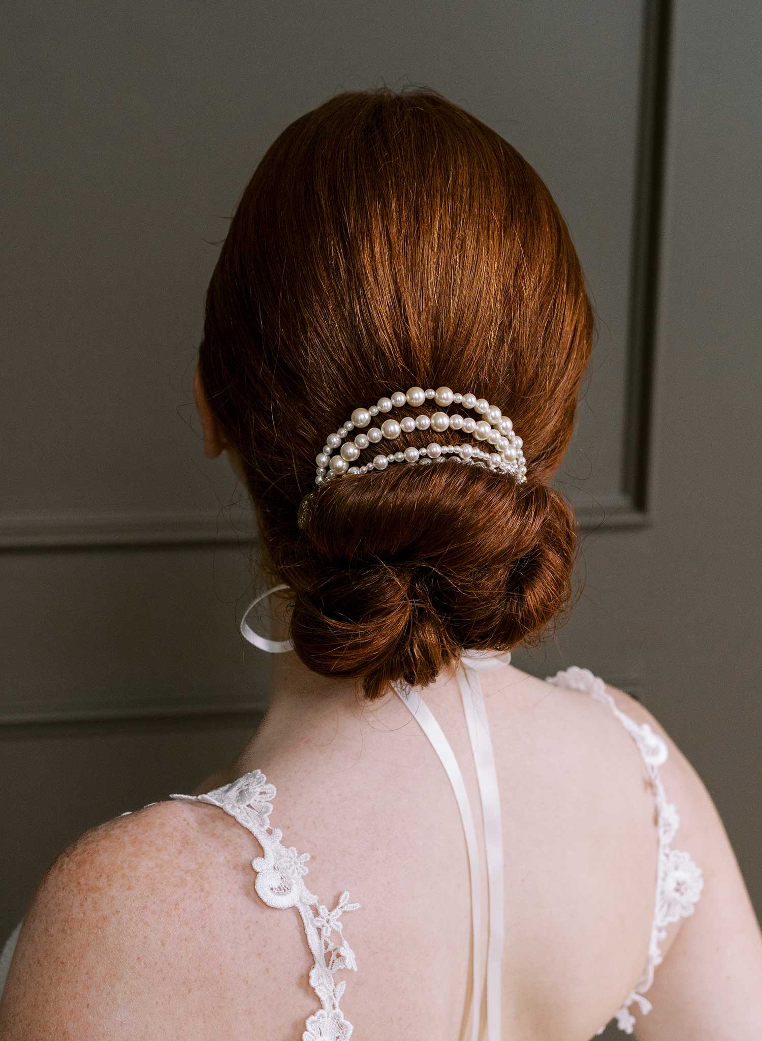 Dark Red Pearl Embellished Low Bun — Bride Hairstyles 2027