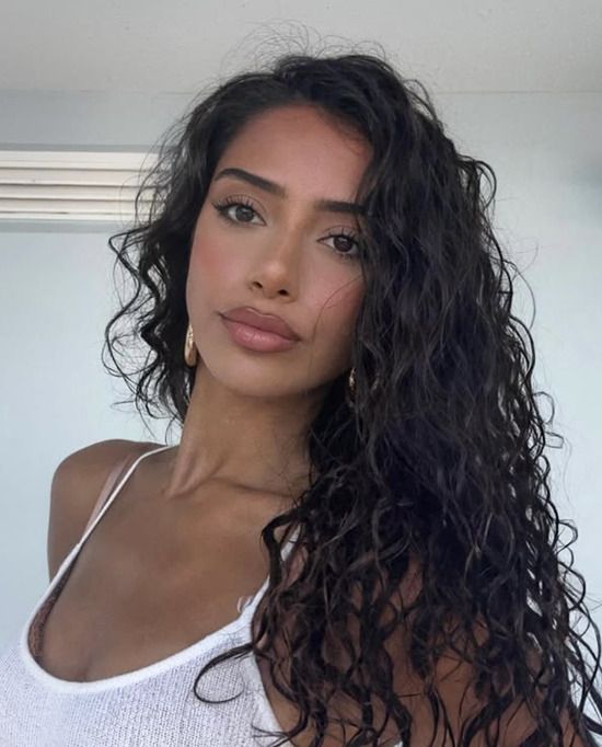 Voluminous Dark Brown Loose Curls Voluminous Dark Brown Loose Curls — Curly Hairstyles 2027 with Weave