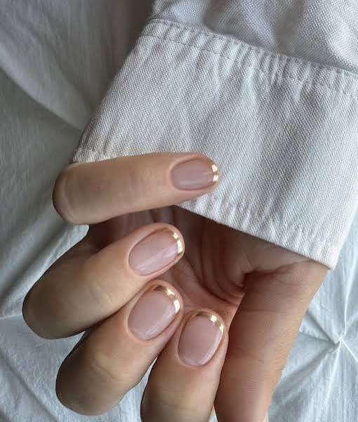 Sheer Pink with Gold Glitter French Outline Sheer Pink with Gold Glitter French Outline — Short New Years Nails 2027