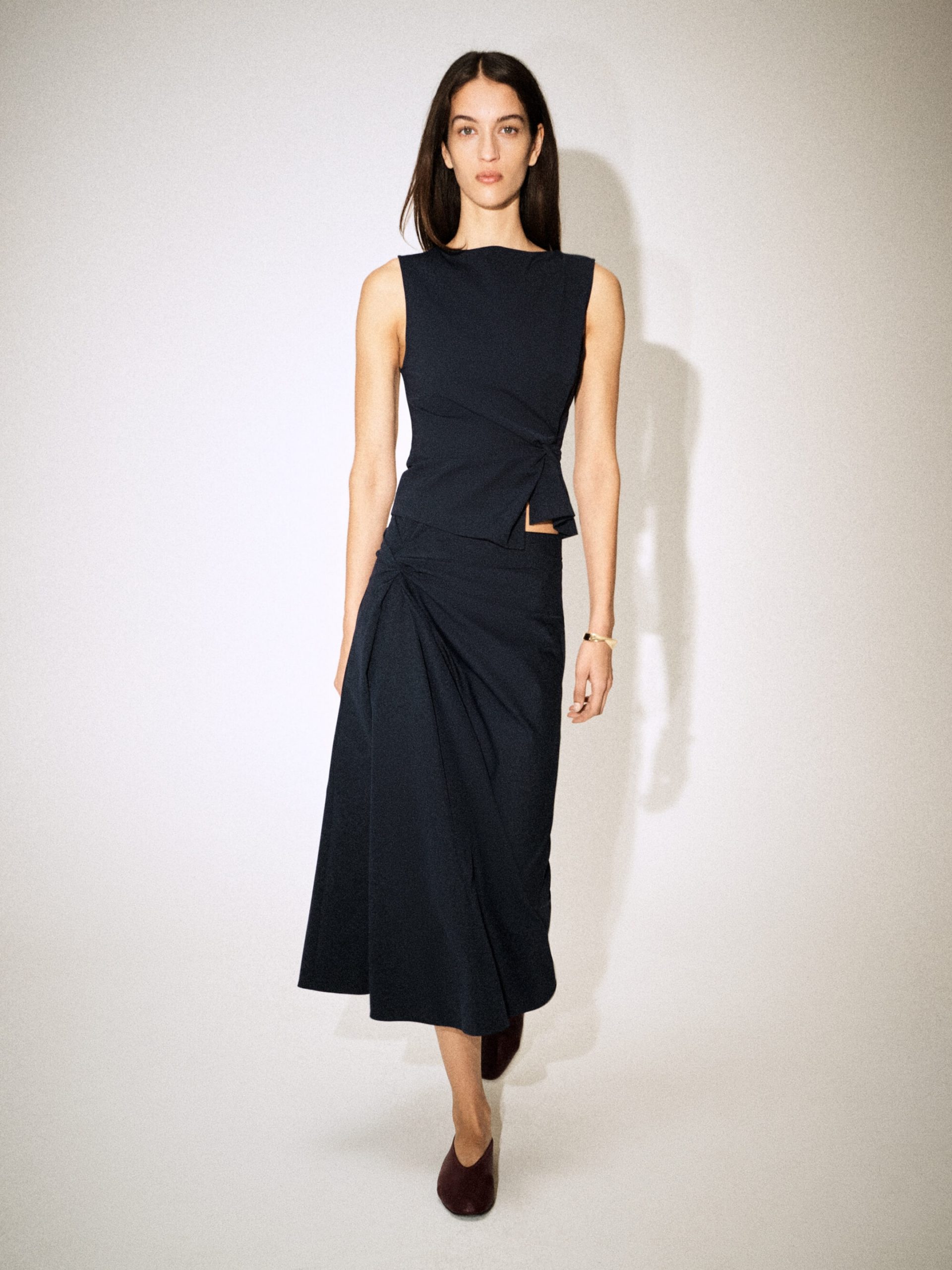 Minimalist Chic with a Dark Navy A-Line Midi Skirt — Midi Skirts 2027