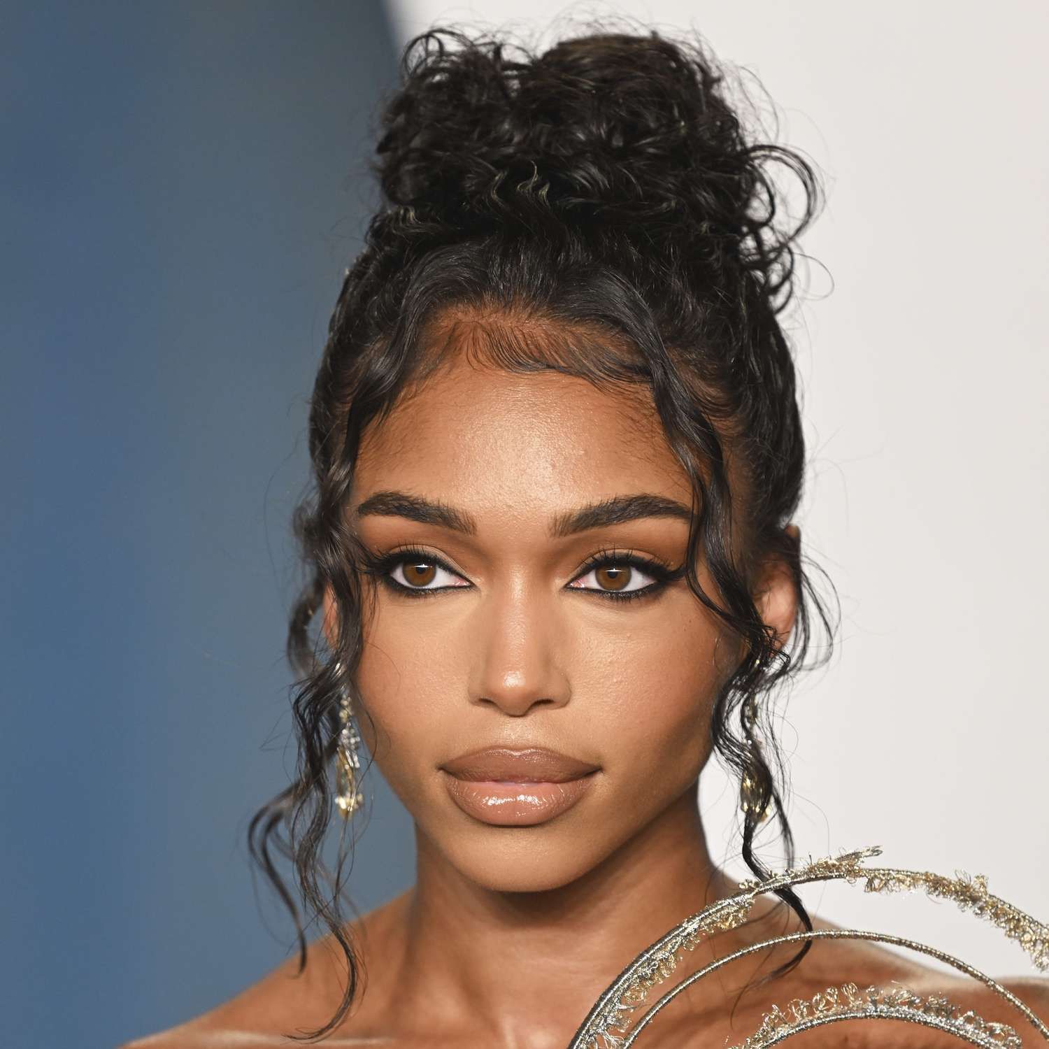 Messy Updo With Face-Framing Tendrils — Party Hairstyles 2027