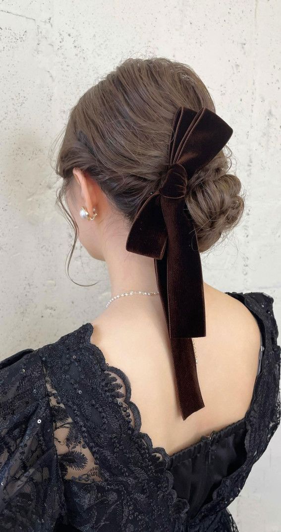 Dark Brown Wavy Bun with Velvet Bow Dark Brown Wavy Bun with Velvet Bow — Side Bun Hairstyles 2027
