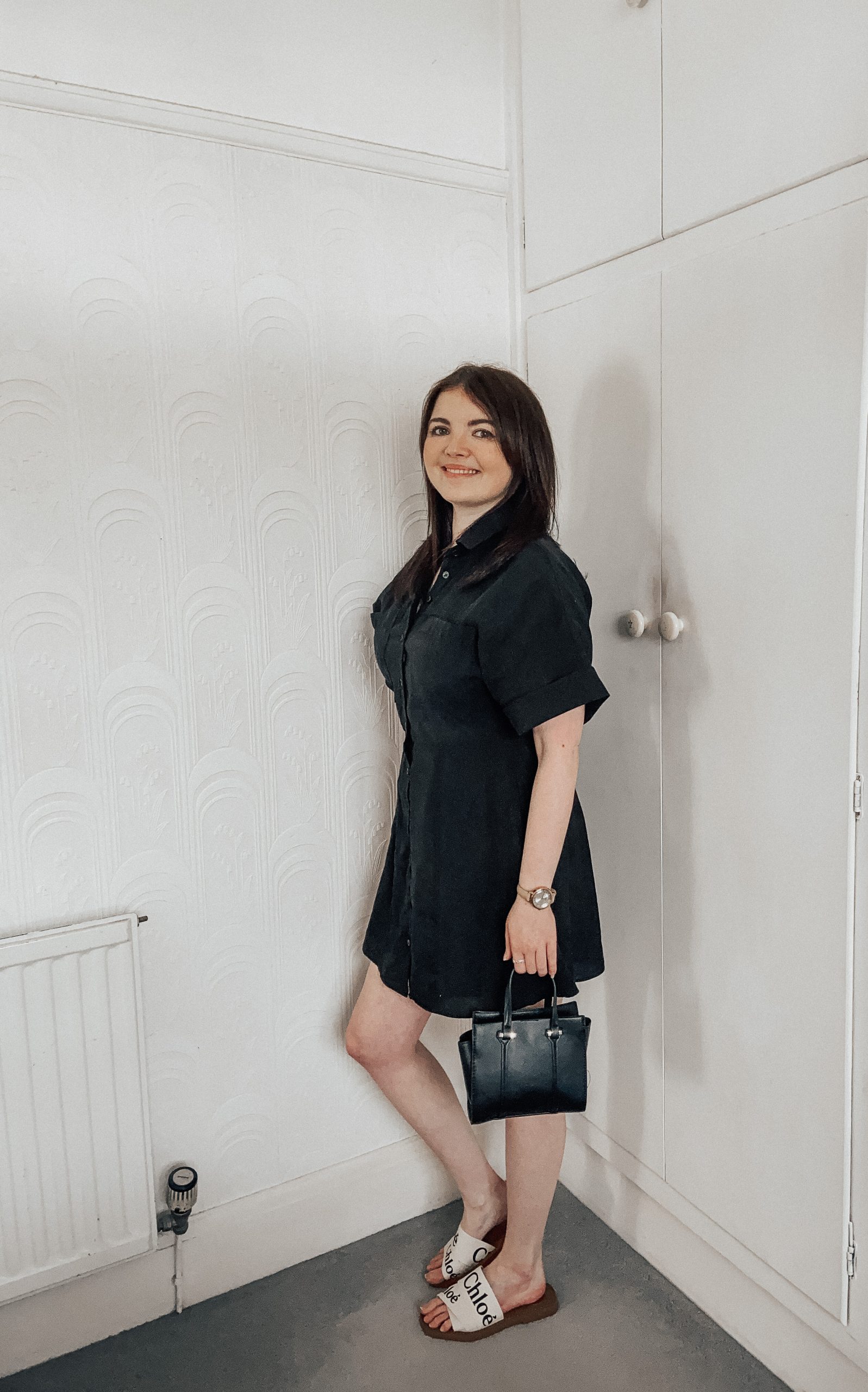 Black Button-Front Mini Dress with Logo Slide Sandals Black Button-Front Mini Dress with Logo Slide Sandals — Dress 2027 with Sandals Outfit