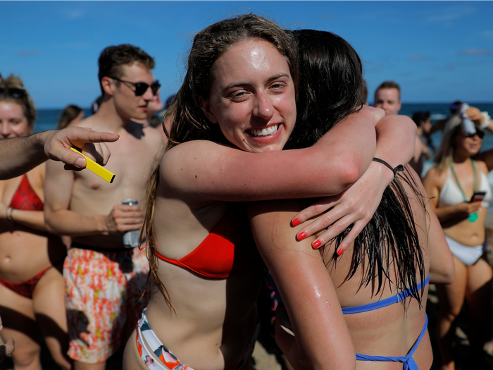 Embracing on a Crowded Spring Break Beach — Spring Break Beach Outfits 2027