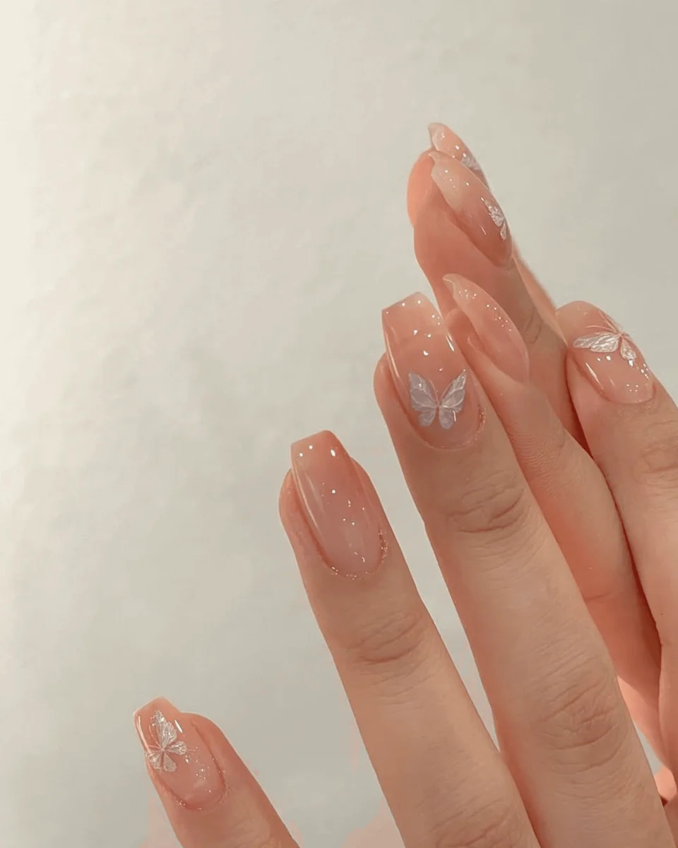 Sheer Nude with Ethereal Butterfly Motifs Sheer Nude with Ethereal Butterfly Motifs — Short Butterfly Coffin Nails 2027