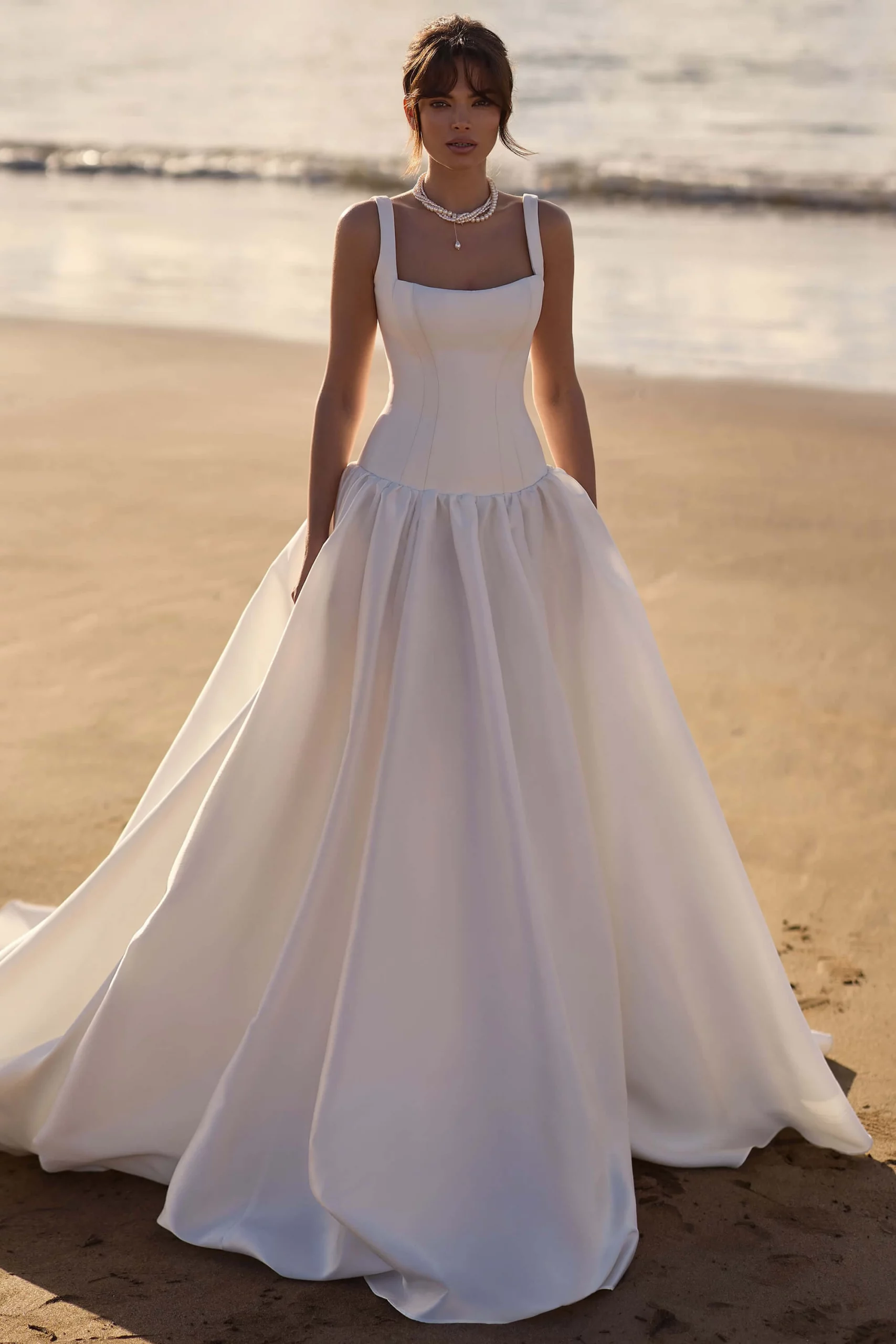 Ivory Satin Ballgown with Elegant Square Neckline and Pearl Necklace Ivory Satin Ballgown with Elegant Square Neckline and Pearl Necklace — Square Neck Wedding Dresses 2027