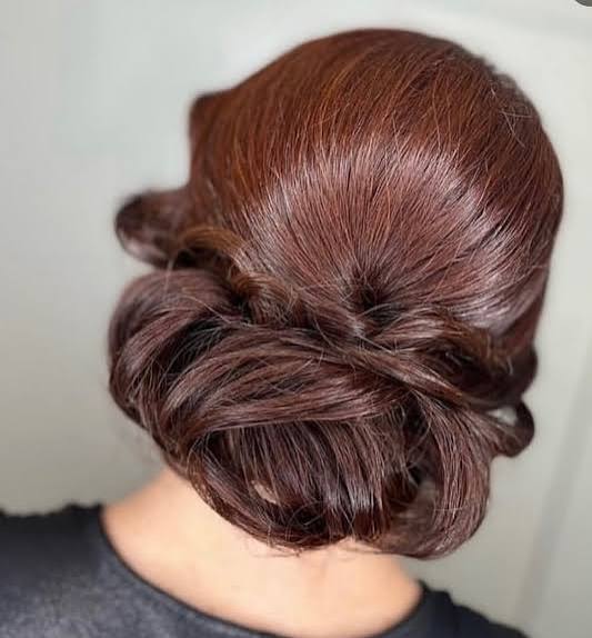 Dark Brown Low Chignon With Twists Dark Brown Low Chignon With Twists — Formal Hairstyles 2027